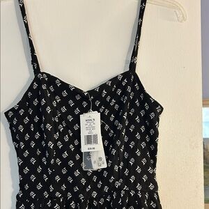 Lily Rose Black Floral Spaghetti Strap jumpsuit with White Print size small NWT